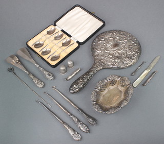 An Edwardian silver bon bon dish with pierced decoration 5" and minor silver ware including cased teaspoons, hand mirror etc 