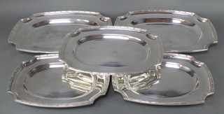 A set of 5 silver plated shaped serving platters 