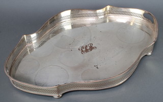 An Edwardian silver plated shaped galleried tray 24" 
