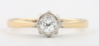 An 18ct yellow gold single stone diamond ring, size K 