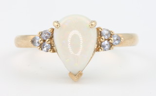 A 9ct yellow gold opal set ring size P 1/2