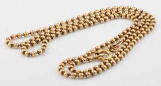 An 18ct gold bead link necklace, 8.1 grams, 17" long 