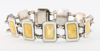 A silver and guilloche enamel white and yellow plaque bracelet 