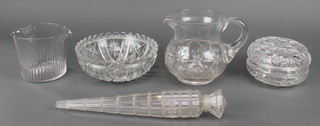 A tapered faceted cut glass scent bottle and stopper 12 1/2", a lidded powder bowl, 2 jugs and a fruit bowl 