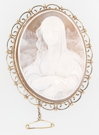 A 9ct yellow gold cameo brooch with a well carved study of a lady 