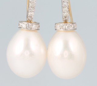 A pair of yellow gold cultured pearl and diamond drop earrings 