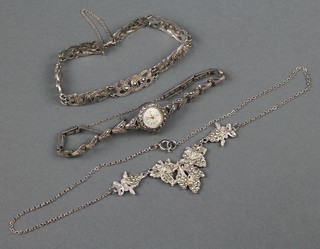 A lady's silver marcasite Accurist wristwatch, a ditto bracelet and necklace 