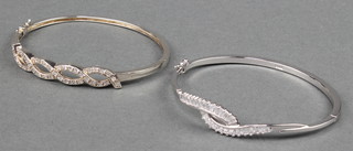 A silver bangle and a ditto bracelet