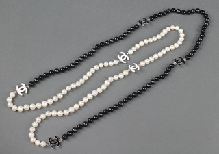 A modern cultured pearl and black bead necklace with enamel interspacers