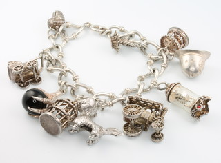 A silver charm bracelet 66 grams