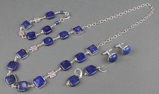 A silver lapis necklace, bracelet, earrings and cufflinks