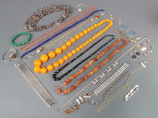 A silver and amber pendant and minor costume jewellery 