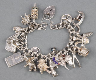 A silver charm bracelet, 70 grams