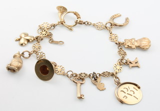 A 9ct yellow gold charm bracelet 11.2 grams