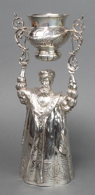 A Continental silver wager or wedding cup in the form of a standing gentleman, import marks for Chester 1901, 614 grams, 11"h