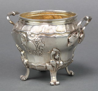 A 19th Century silver baluster sugar bowl with twin handles and scroll decoration import marks London 1885, 3", 240 grams