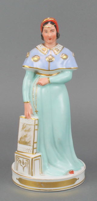 A 19th Century French porcelain liqueur bottle in the form of a standing nun 11" 
