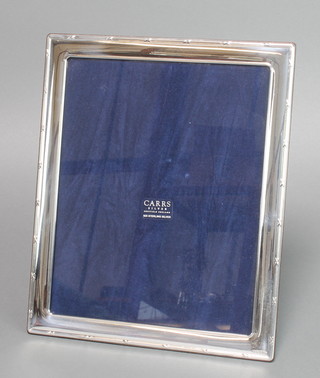A sterling silver rectangular photograph frame 11 1/2" x 9 1/2" 