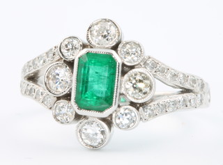 An 18ct white gold emerald and diamond Edwardian style ring, size M 