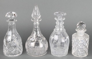 A Georgian mallet shaped ring neck decanter with mushroom stopper 9" and 3 other decanters and stoppers 