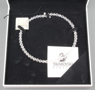 A Swarovski crystal necklace boxed