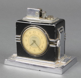 Ronson, an Art Deco Touch-Tip table lighter fitted a timepiece contained in a stepped chrome and black case  
