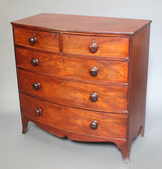 A 19th Century mahogany bow front chest of 2 short and 3 long drawers, raised on splayed bracket feet 40"h x 48 1/2"w x 20 1/2"d 