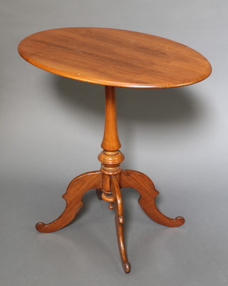 A Victorian oval mahogany wine table raised on turned baluster tripod base 28 1/2"h x 28"w x 19"d 