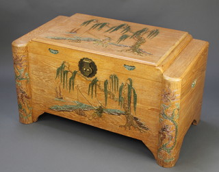 A bleached carved camphor coffer with brass lock 22"h x 39 1/2"w x 21 1/2"d  