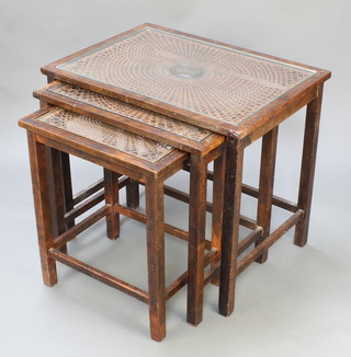 A nest of 3 rectangular Colonial mahogany and woven cane interfitting coffee tables, raised on square supports 24"h x 27 1/2"w x 20"d, 23"h x 23"w x 16" 1/2"d, 22"h x 18 1/2"w x 14 1/2"d   