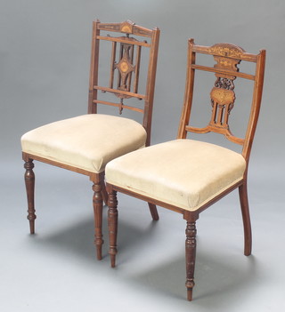A Victorian inlaid rosewood stick and bar back bedroom chair with upholstered seat, raised on turned and fluted supports, together with a similar bedroom chair 