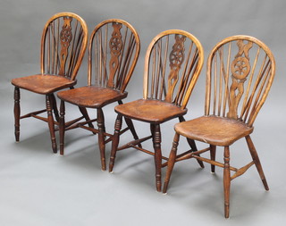 2 pairs of 19th Century elm stick and wheel back Windsor chairs with solid seats raised on turned supports with H framed stretcher 