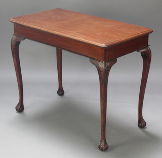An Edwardian Chippendale style rectangular mahogany occasional table raised on cabriole supports 28 1/2"h x 36"w x 20"d 