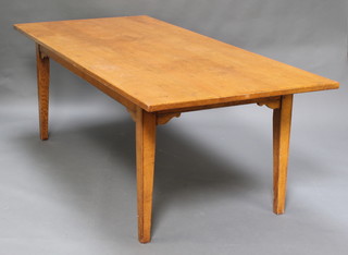 A 19th Century rectangular elm dining table, raised on square tapered supports 29 1/2"h x 84"l x 38 1/2"w 