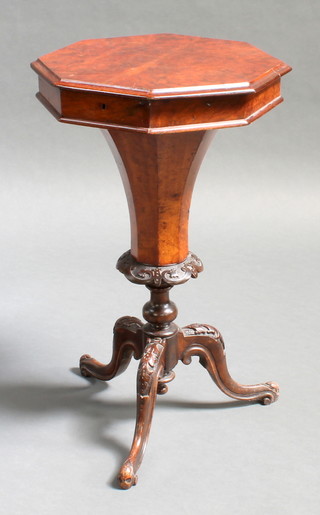 A Victorian figured walnut work table of conical form with hinged lid, raised on cabriole supports 30"h x 18"w x 17"d 