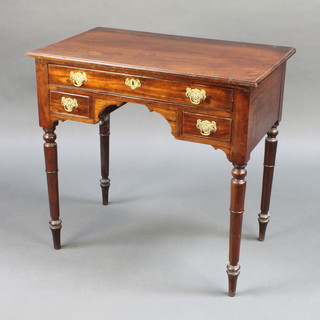 A 19th Century mahogany side table fitted 1 long and 2 short drawers, raised on turned supports 30"h x 31"w x 19"d 