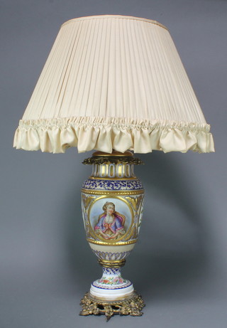A 19th Century Paris Porcelain oviform table lamp decorated with a portrait figure of a lady and panels of spring flowers, having ormolu mounts 18" 