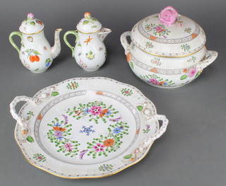A quantity of Herend tableware comprising 3 tureens and covers, 2 handled platter, 2 jugs, 2 tea pots, coffee pot, 2 coffee cups and saucers, a tea cup, bowl, cream jug and plate