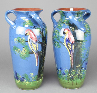 A pair of 1930's Studio vases decorated with parrots 12" 