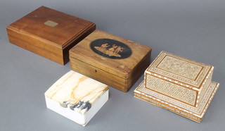 A white grained marble cigarette box made from the walls of the Stock Exchange building demolished 1970  2" x 5" x 4 1/2",  a Moorish style cigarette box with hinged lid 3 1/2" x 7" x 6" (feet missing and some inlay), a cedar humidor 2" x 9 1/2" x 7", an inlaid olive wood box decorated dancing figures and marked Bellagio 2 1/2" x 8" x 6" (some water damage) 