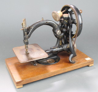 A Wilcox & Gibbs chain stitch sewing machine
