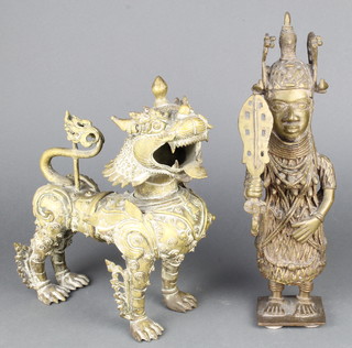 A Benin style bronze figure of a standing warrior 15"h and a gilt bronze figure of a Dog of Fo 13" x 10" 