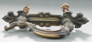 A Victorian brass door knocker 