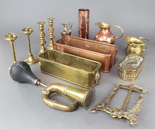 A pair of Victorian brass candlesticks 7 1/2"h, 1 other pair 7", an oval pierced brass dish, 2 rectangular copper and brass planters, a cast brass easel photograph frame etc
