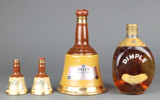 A bottle of Dimple Haig whisky, a Bells Wade Whisky decanter and 2 Wade Whisky decanters 4"