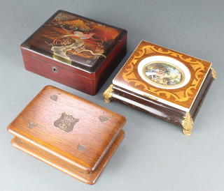 A Japanese red lacquered box with hinged lid, a cushion shaped inlaid mahogany  musical jewellery box the lid decorated a mountain scene 3" x 8" x 7", rectangular carved wooden card box with Naval crown marked RNB, 2" x 8" x 6"