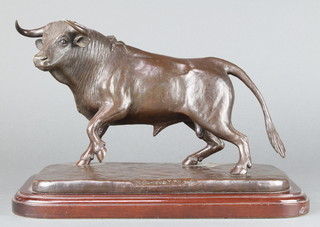 M Domecq.y., a limited edition bronze figure of a standing bull marked M Domecq.y 94 30/50, raised on a mahogany base 8"h x 14 1/2"w x 7"d 