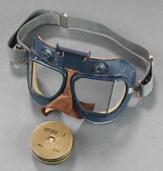 A pair of Air Ministry issue 22C/826 1858 goggles together with a tin of Anti Dimming Mk 6