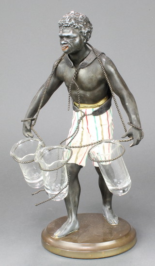 A 19th Century spelter epergne in the form of a bound gentleman, raised on oval base fitted with vases 13" x 6" diam. 