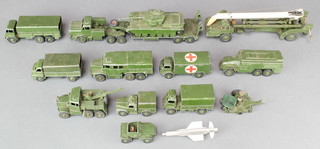 13 Dinky Military vehicles including 689 medium artillery tractor, 626 ambulance, 671 armoured command vehicle, 661 recovery tractor, 651 Centurion tank, 622 10 ton Army truck, 621 3 ton ditto, 623 Army wagon, 641 1 ton cargo truck, 673 scout car, 650 tank transporter, a Dinky Supertoy missile launcher and Thunderbird guided missile (play worn in places)